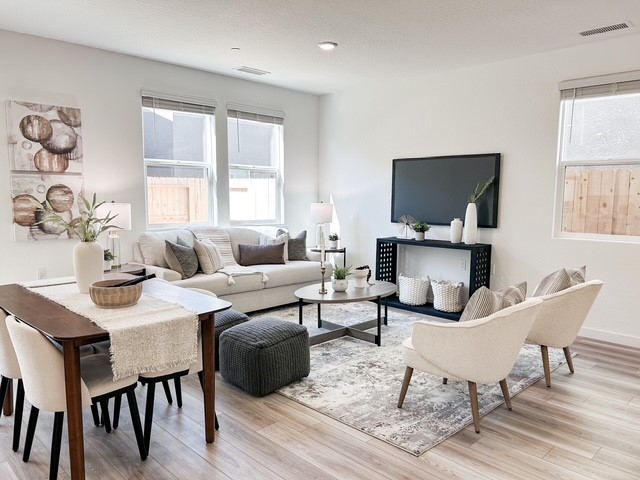 A living room with a fireplace.