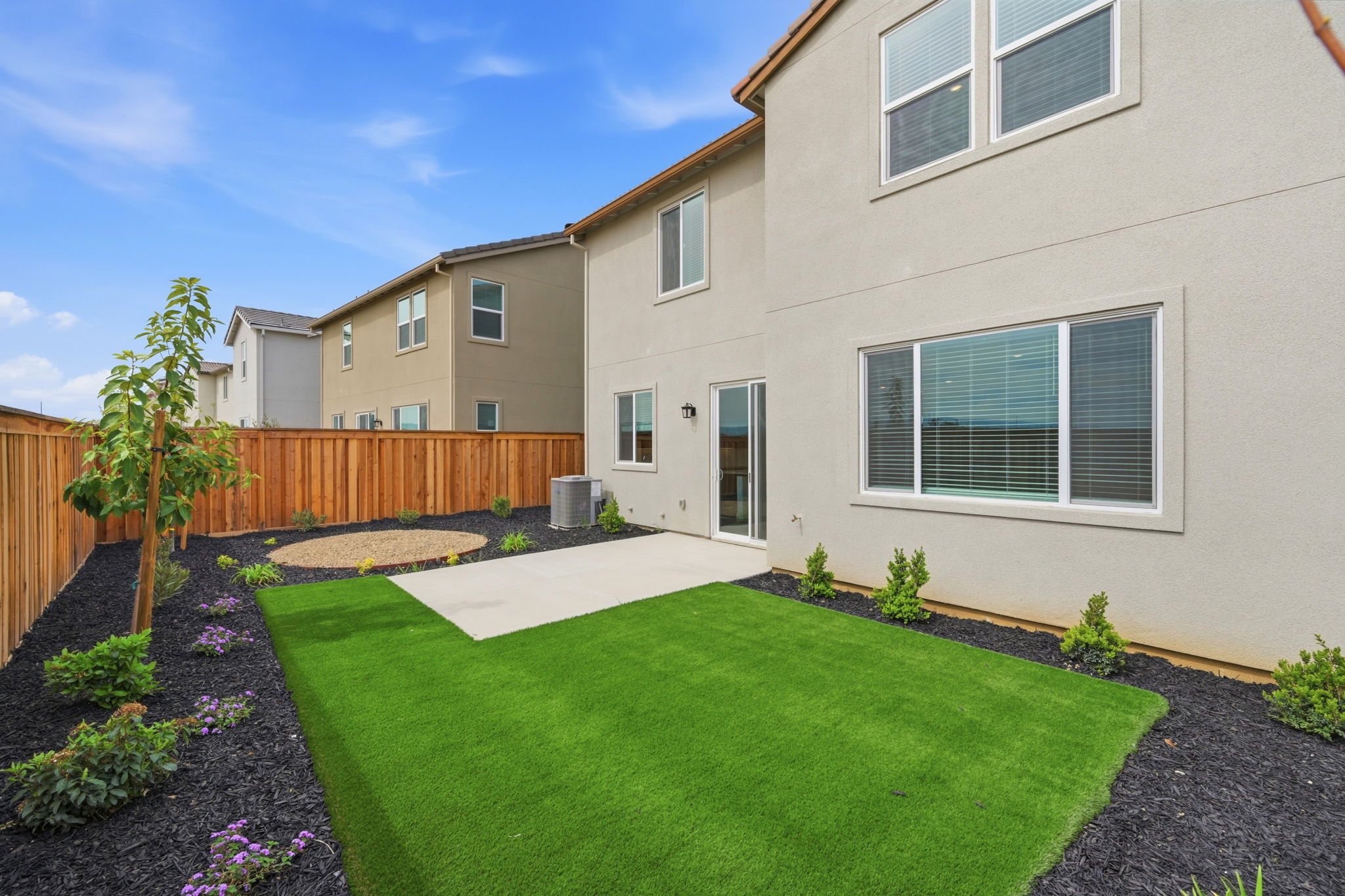 A house with a green yard.