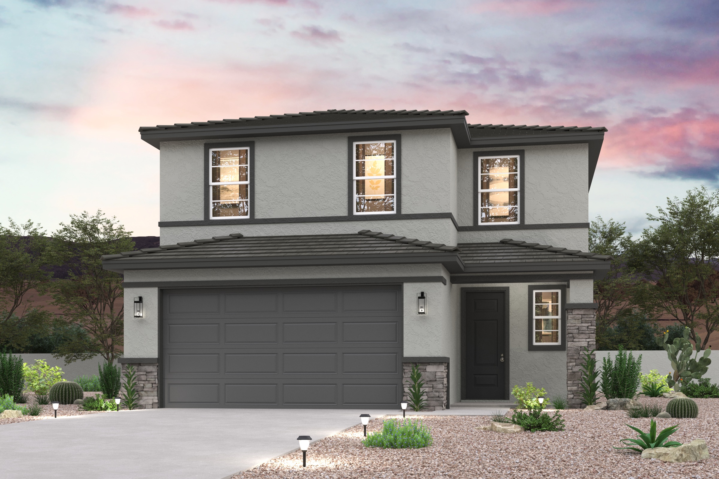 A grey house with a garage.