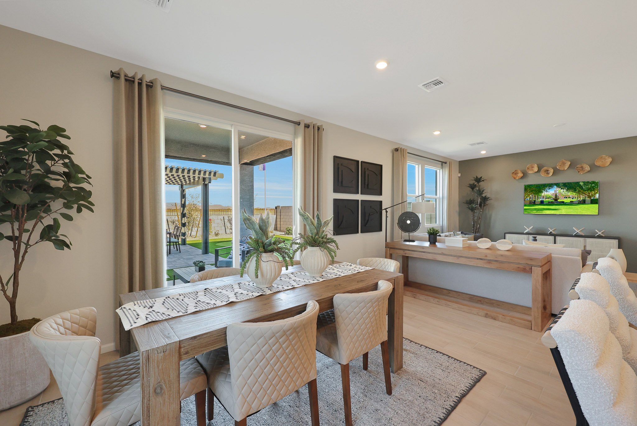 A dining room with a large window.