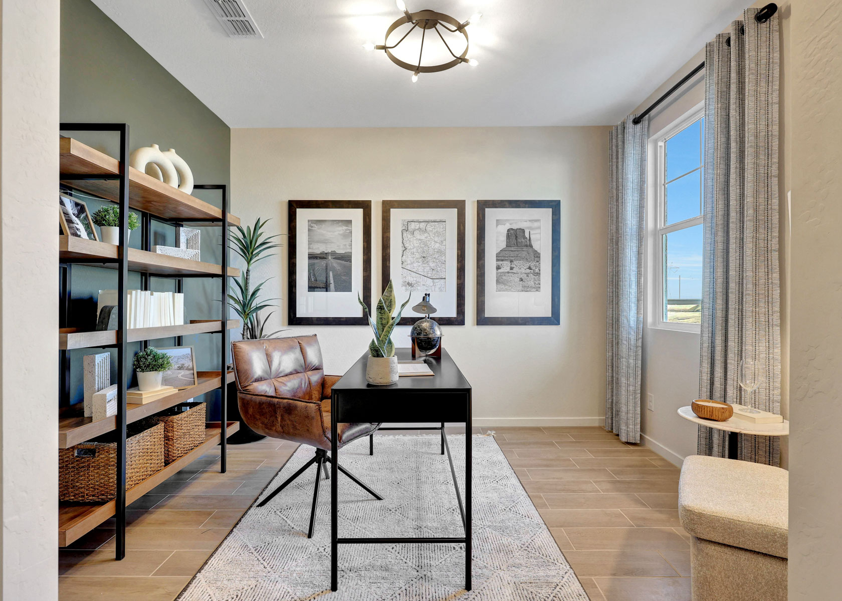 A room with a table and chairs.