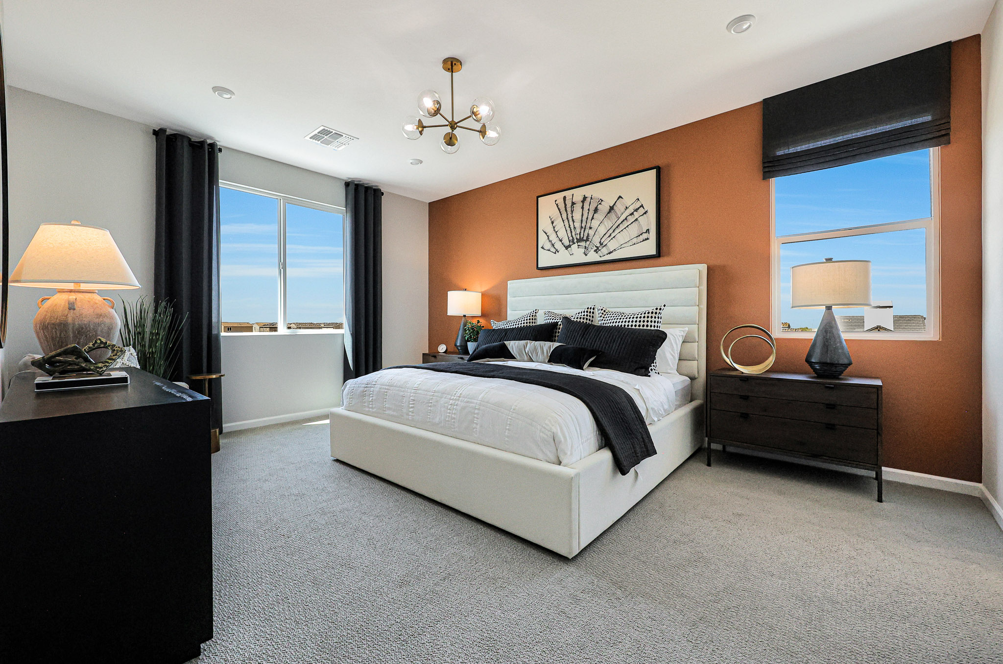 A bedroom with a large bed.