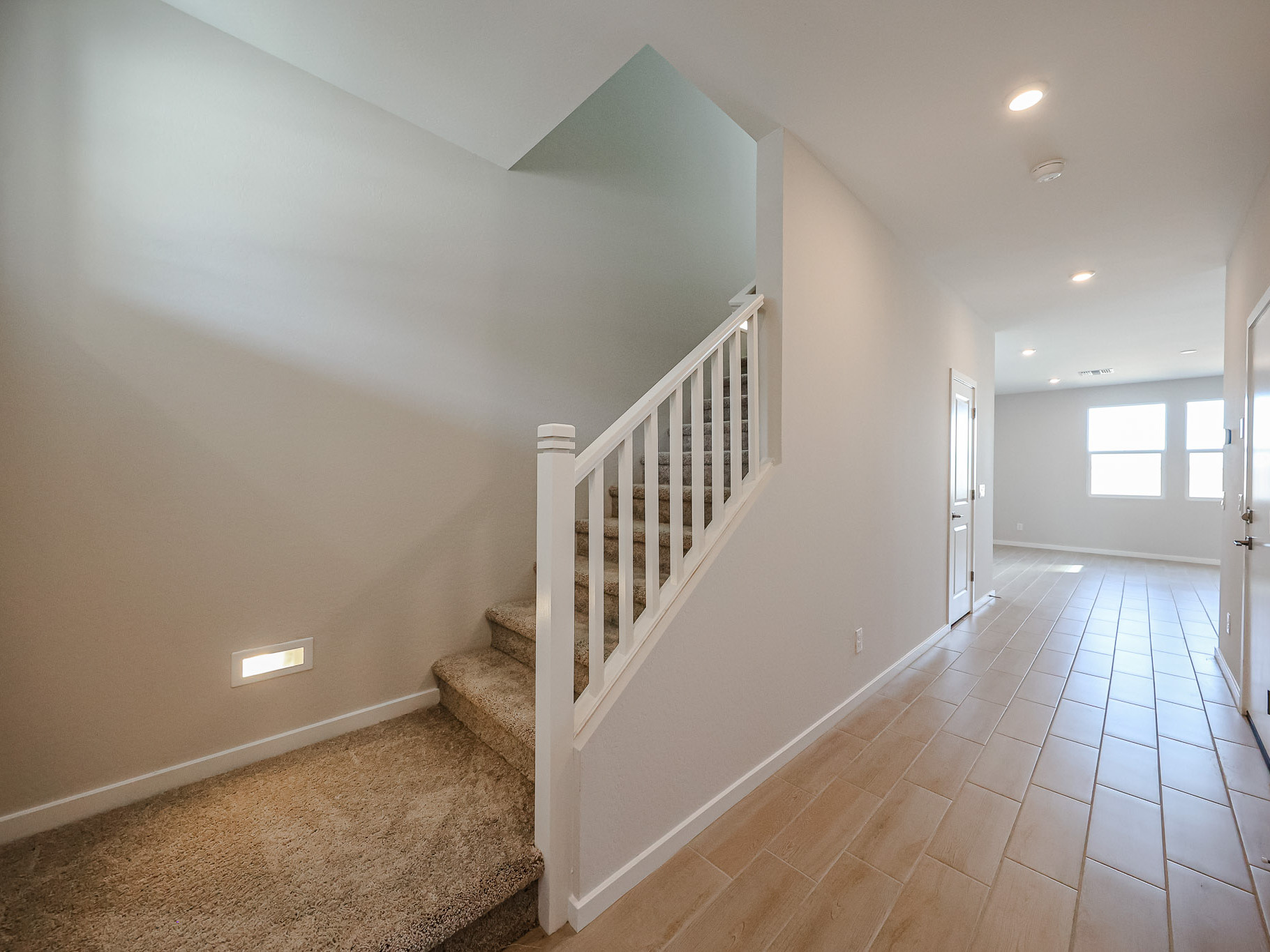 A white staircase in a house.