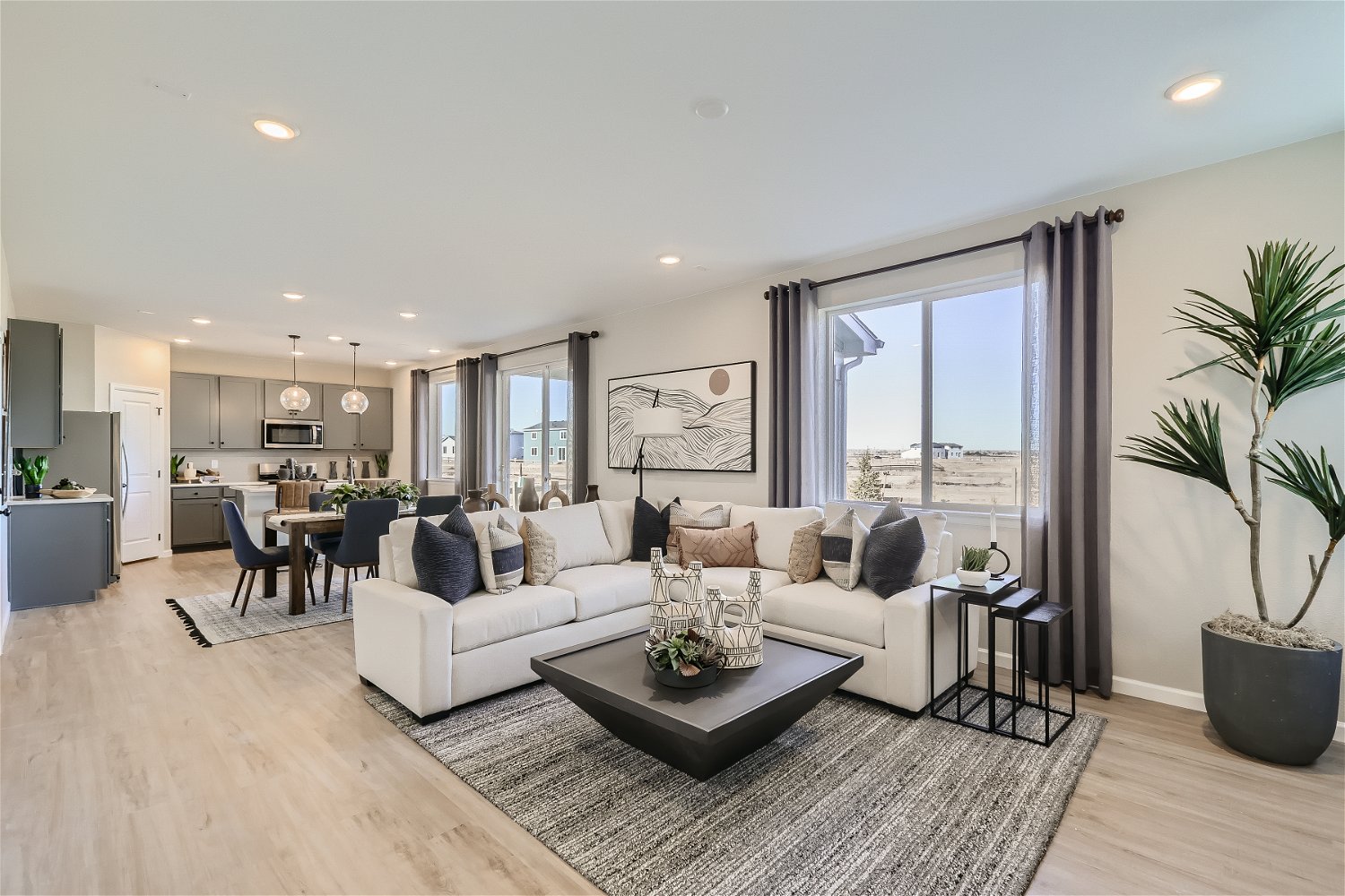 A living room with a large window.