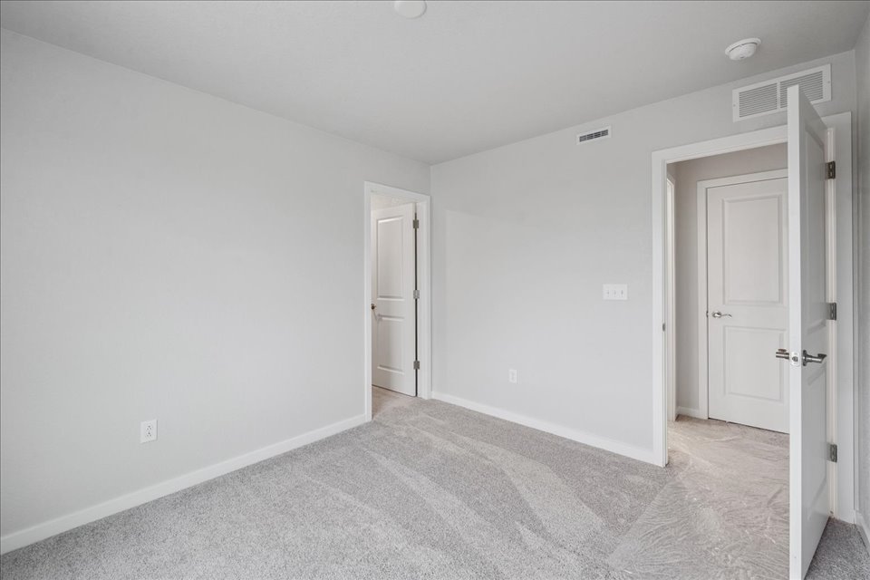 A room with white doors.