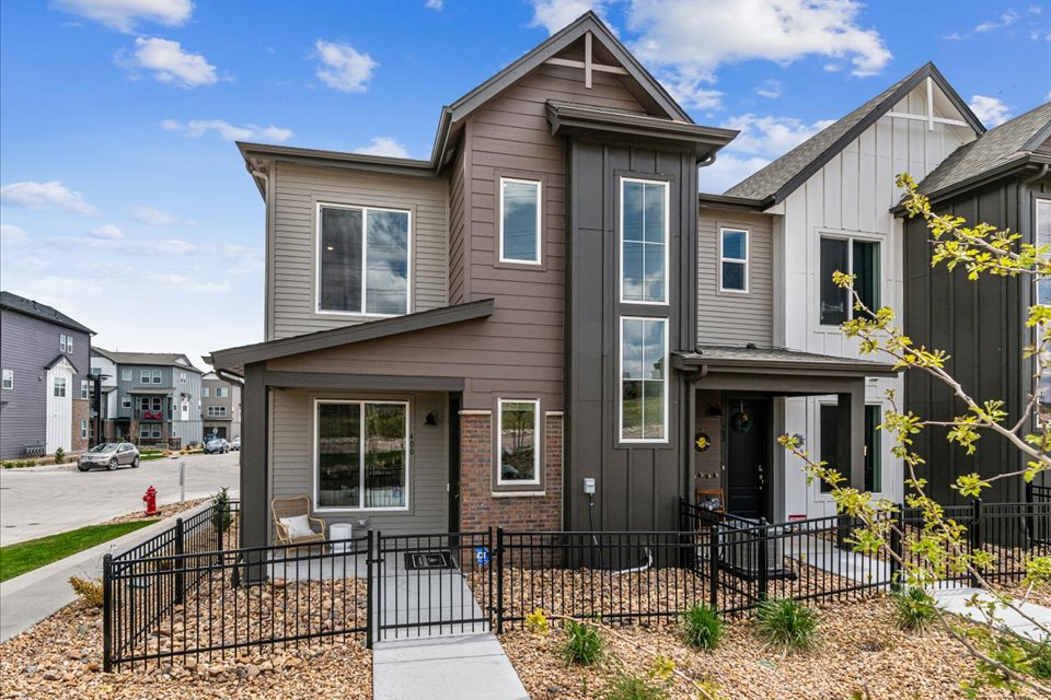 A house with a fence around it.