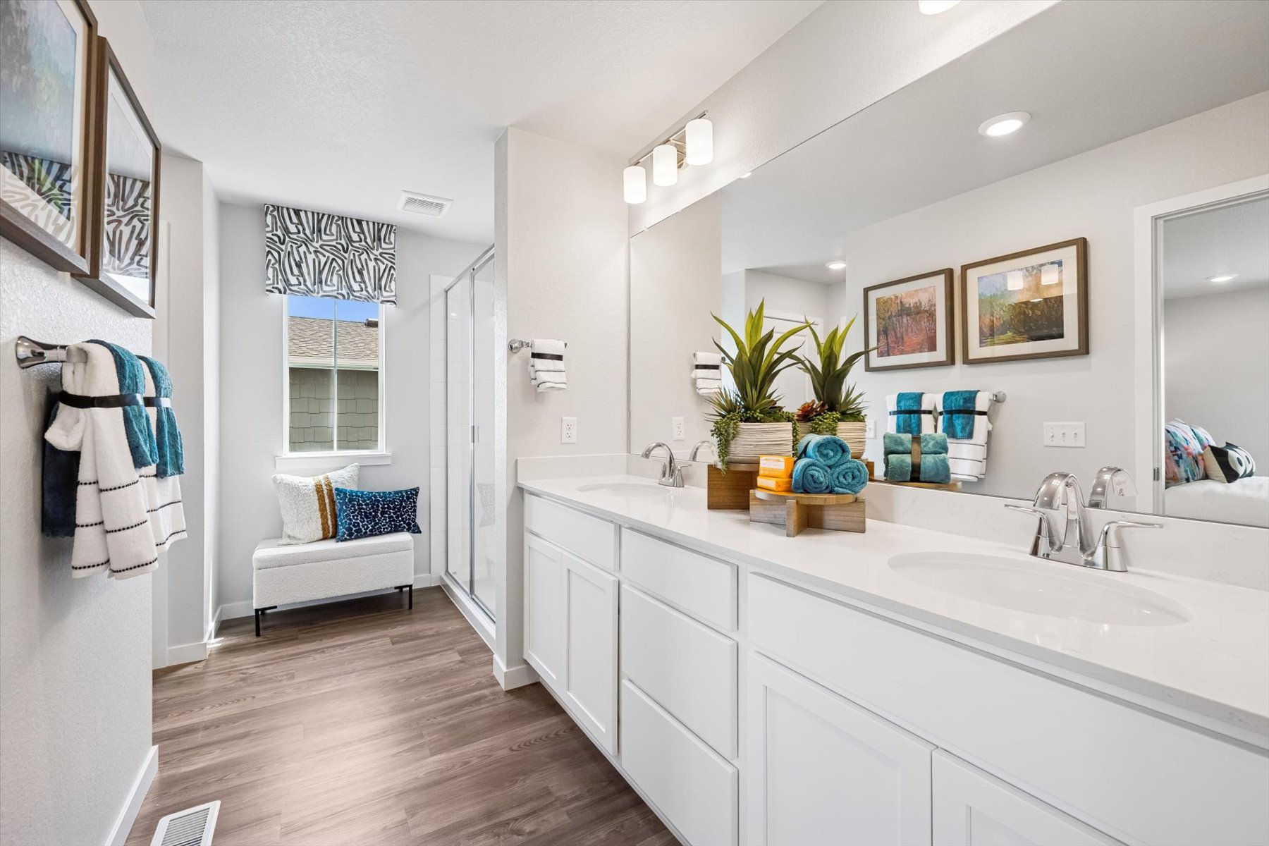 A bathroom with a tub and sink.