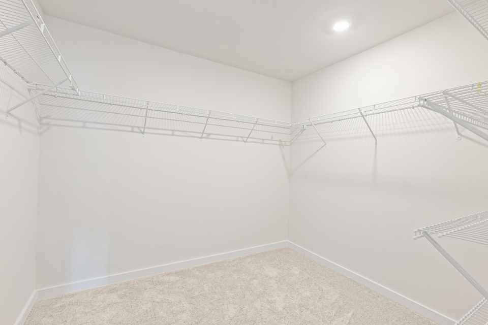 A white room with a white wall.