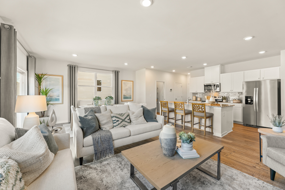 A living room with a couch and a table.