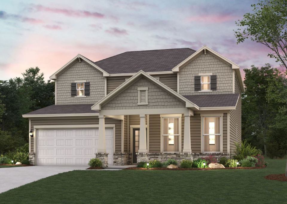 A house with a large front yard.