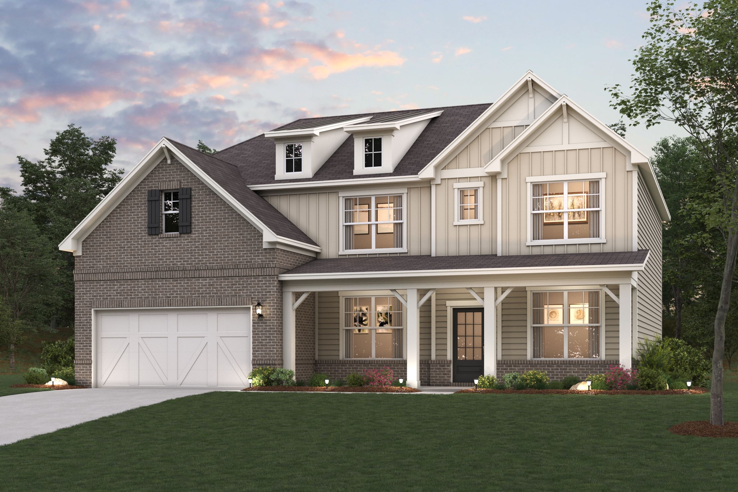 A house with a lawn in front.