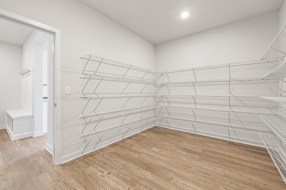 A white staircase in a room.