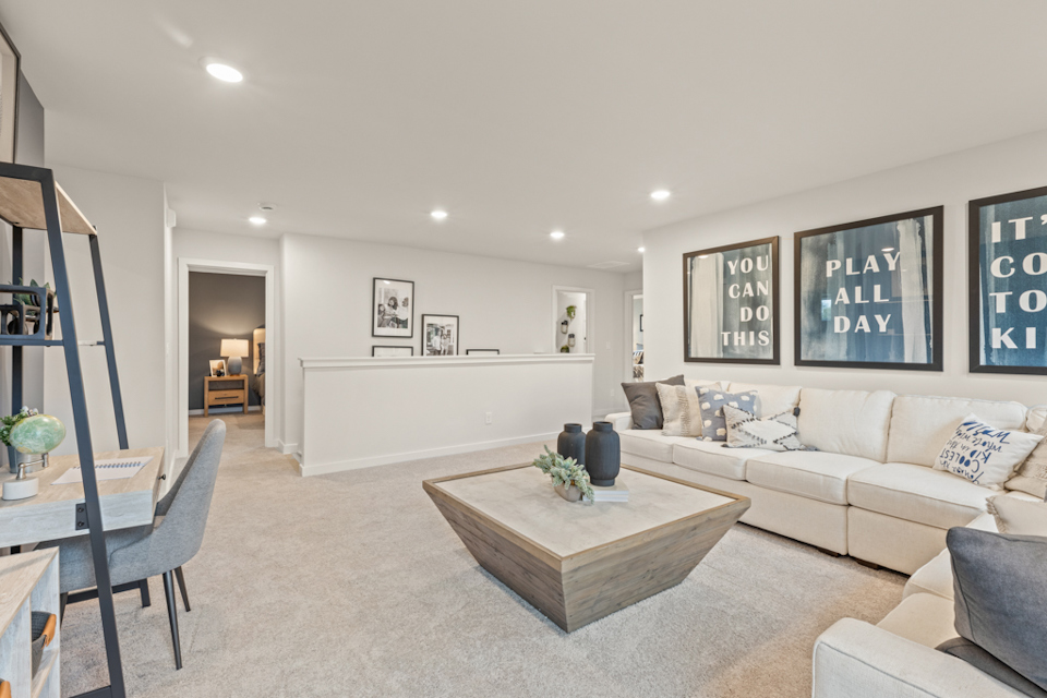 A living room with a couch and a coffee table.