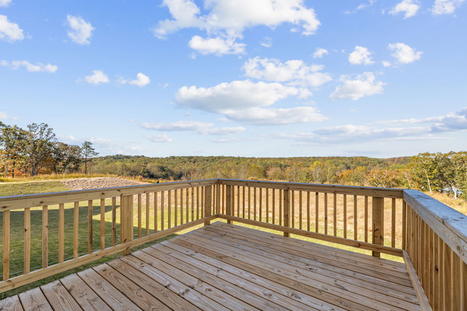 A wooden bridge over a river.