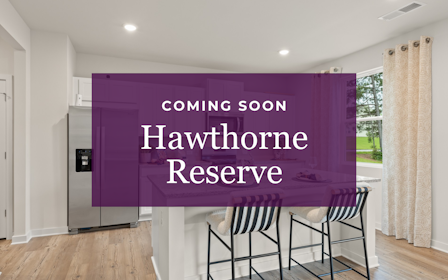 A room with a table and chairs.