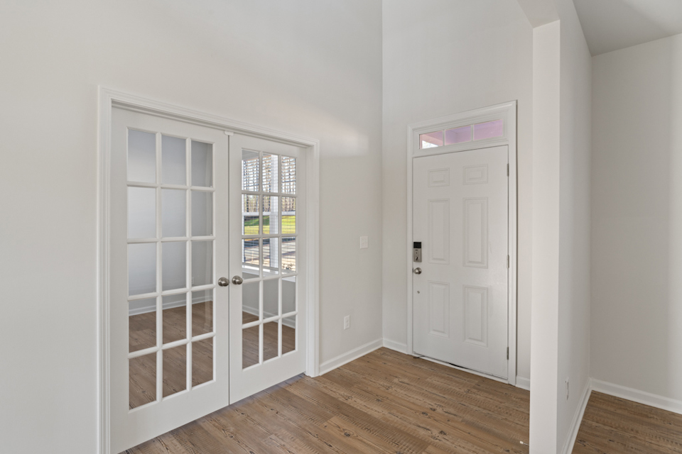 A room with white doors.