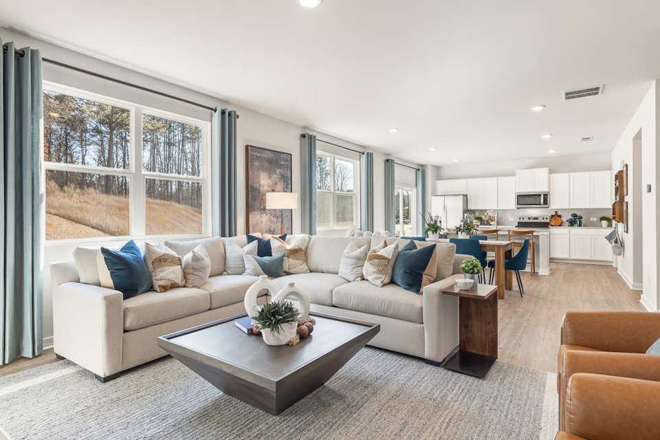 A living room with a large window.