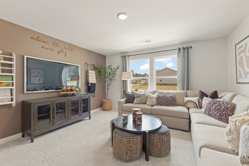 A living room with a fireplace.