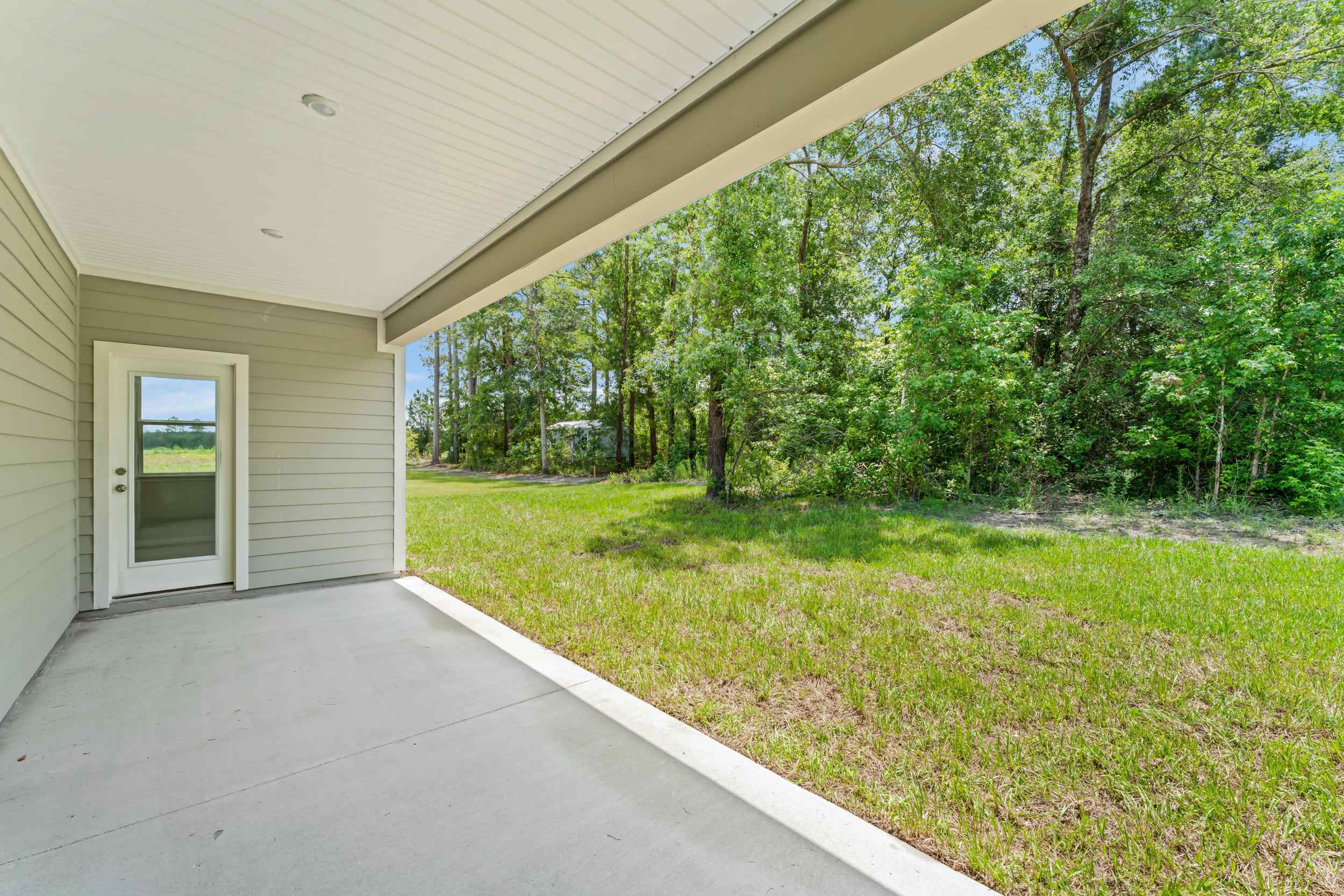 River Birch Lot 587 Covered Back Patio at NorthShore in Kingsland