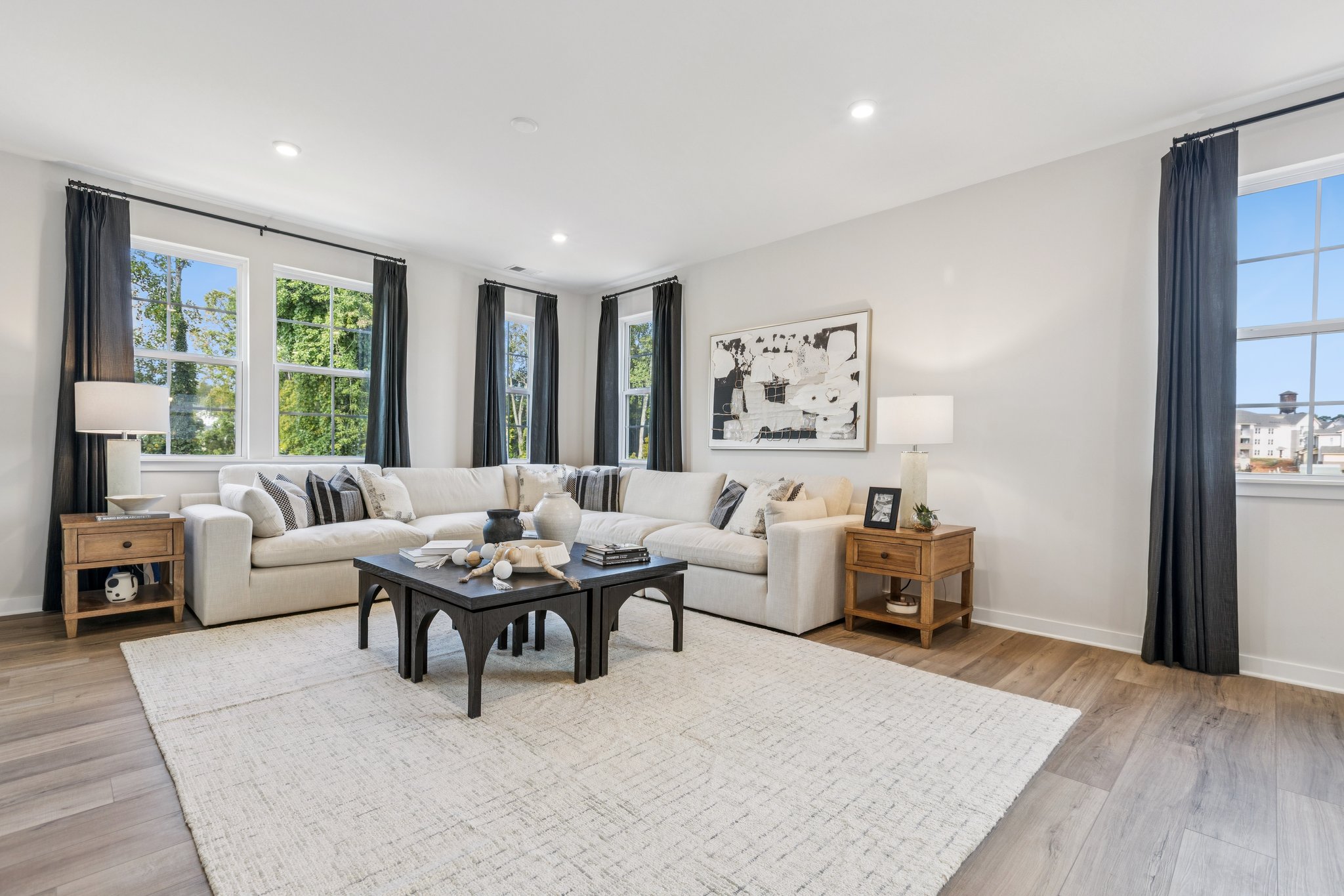 A living room with a large window.
