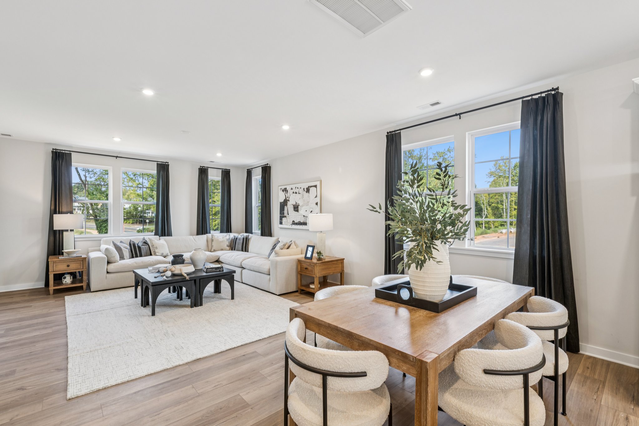 A living room with a large window.