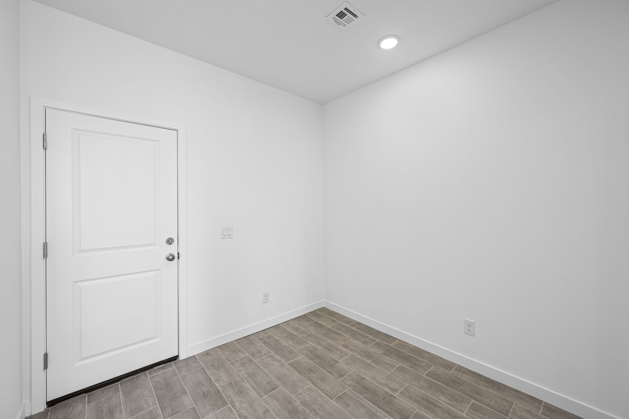 A room with white walls.