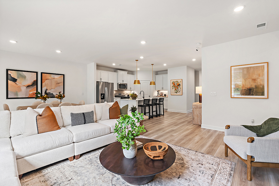A living room with a couch and a coffee table.