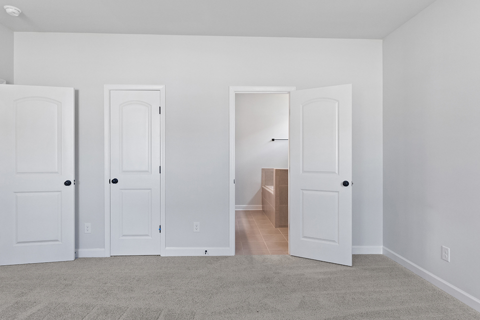 A room with white doors.