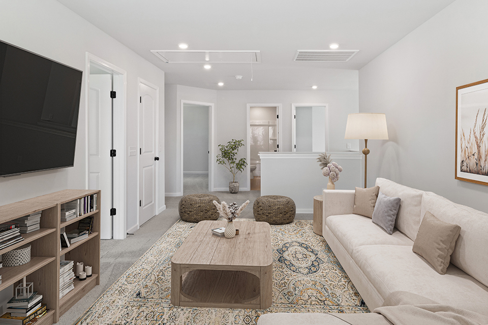 A living room with a large mirror.