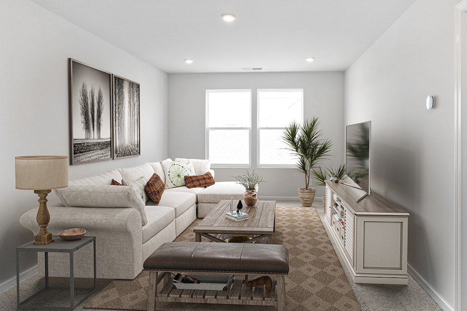 A living room with a couch and coffee table.