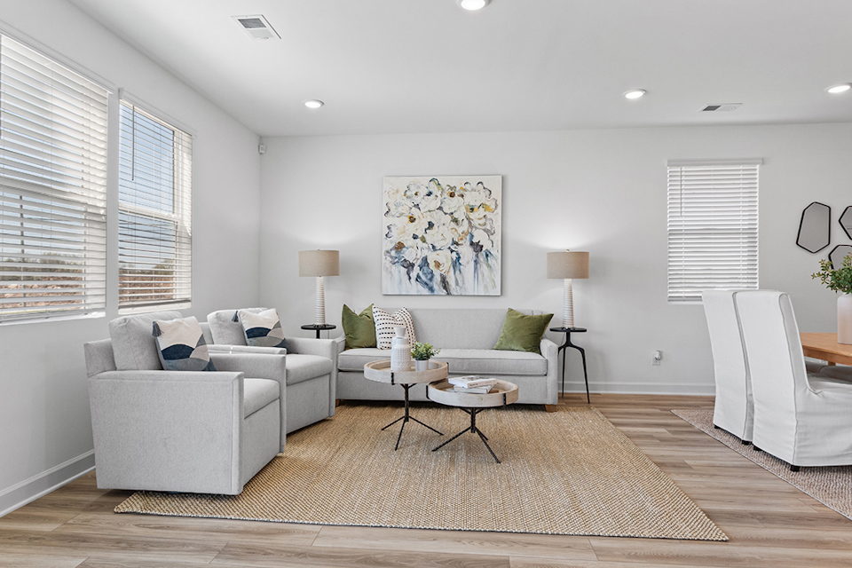 A living room with a couch and a coffee table.