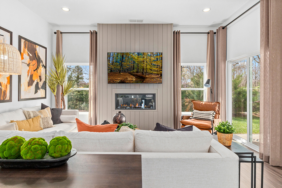 A living room with a large window.