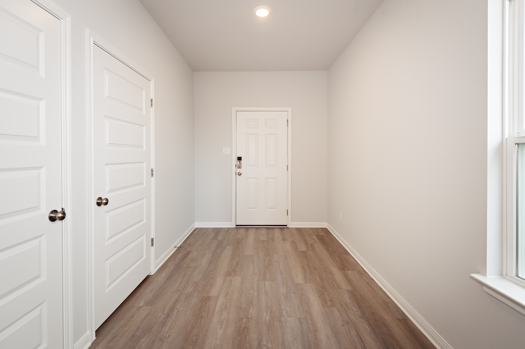 A room with white doors.