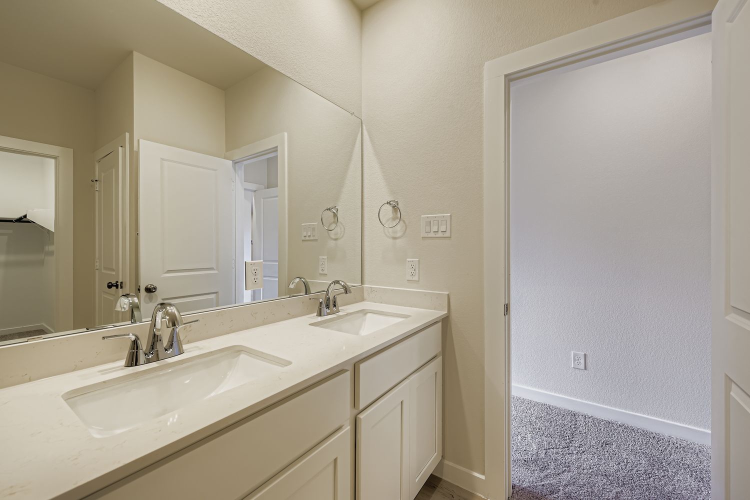 A bathroom with two sinks.