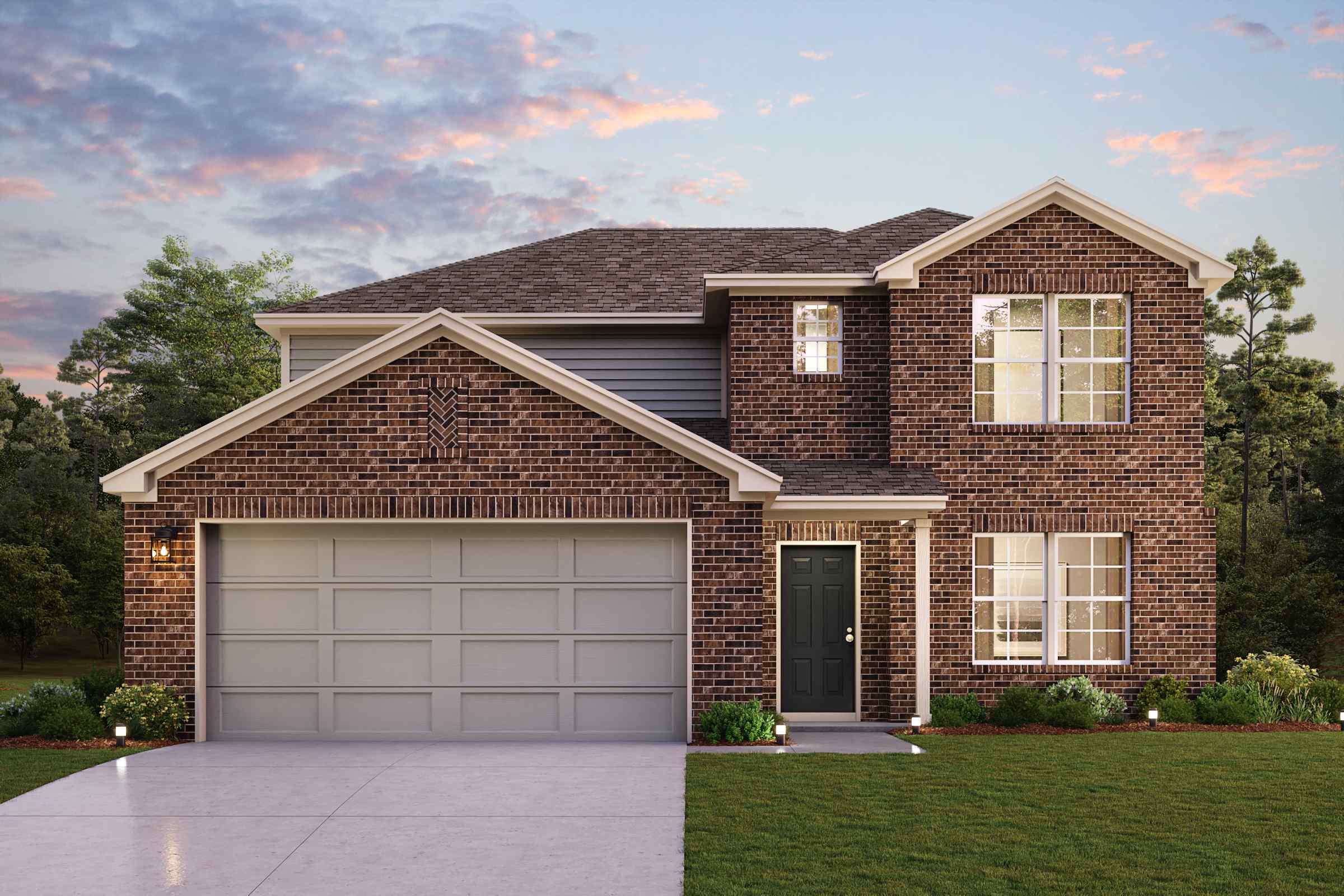 A brick house with a garage.