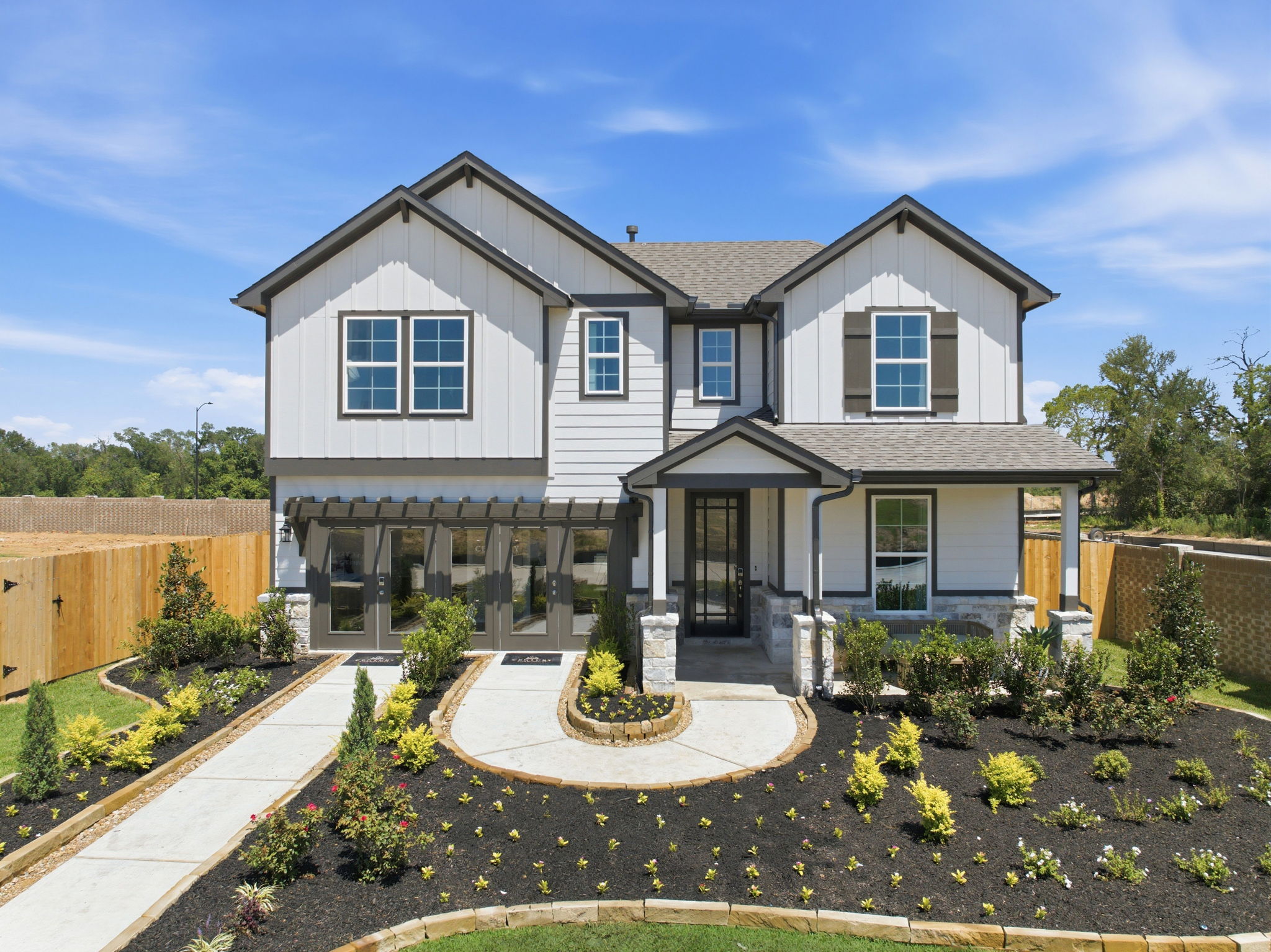 A house with a large front yard.