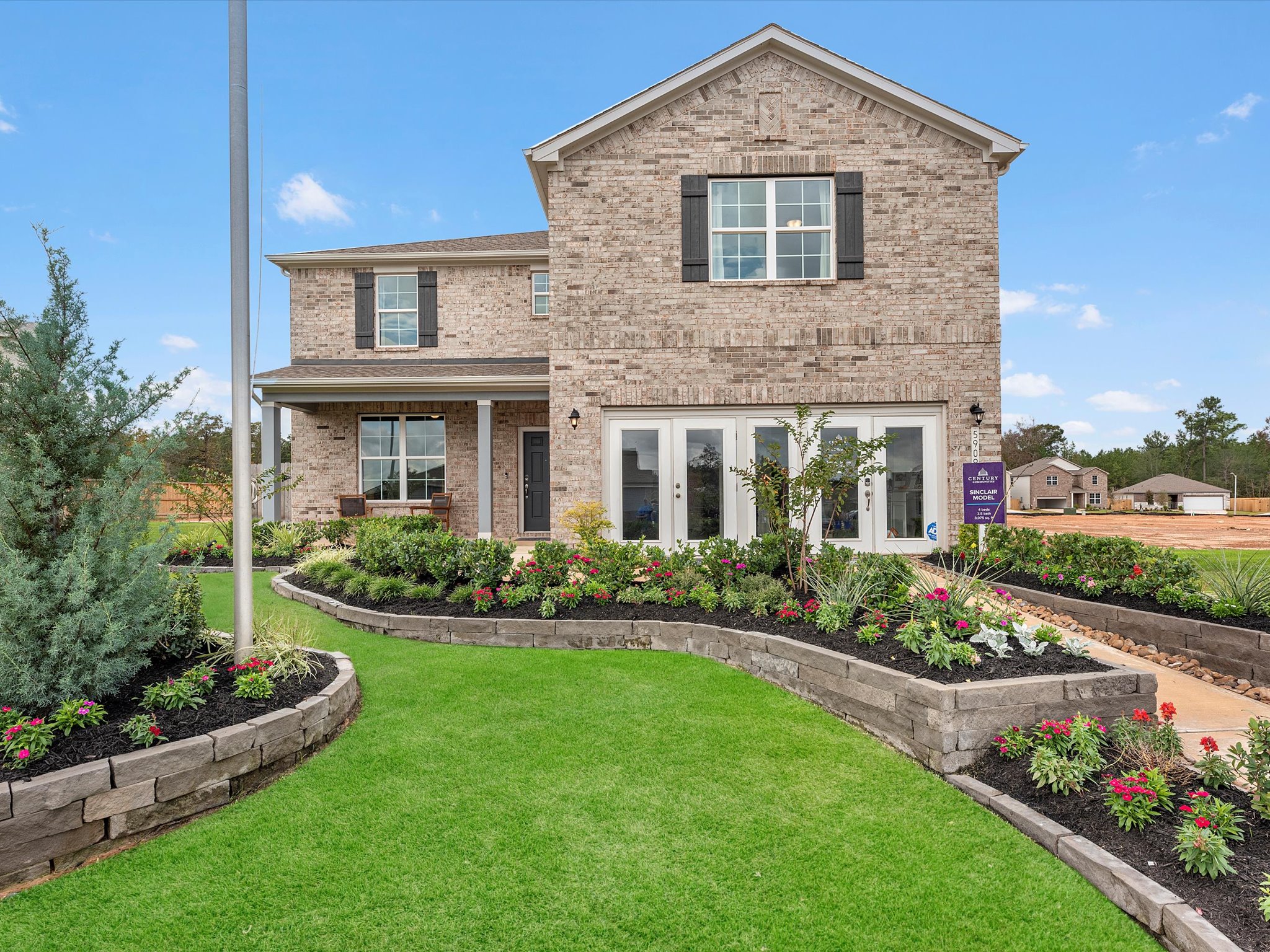 A house with a large front yard.