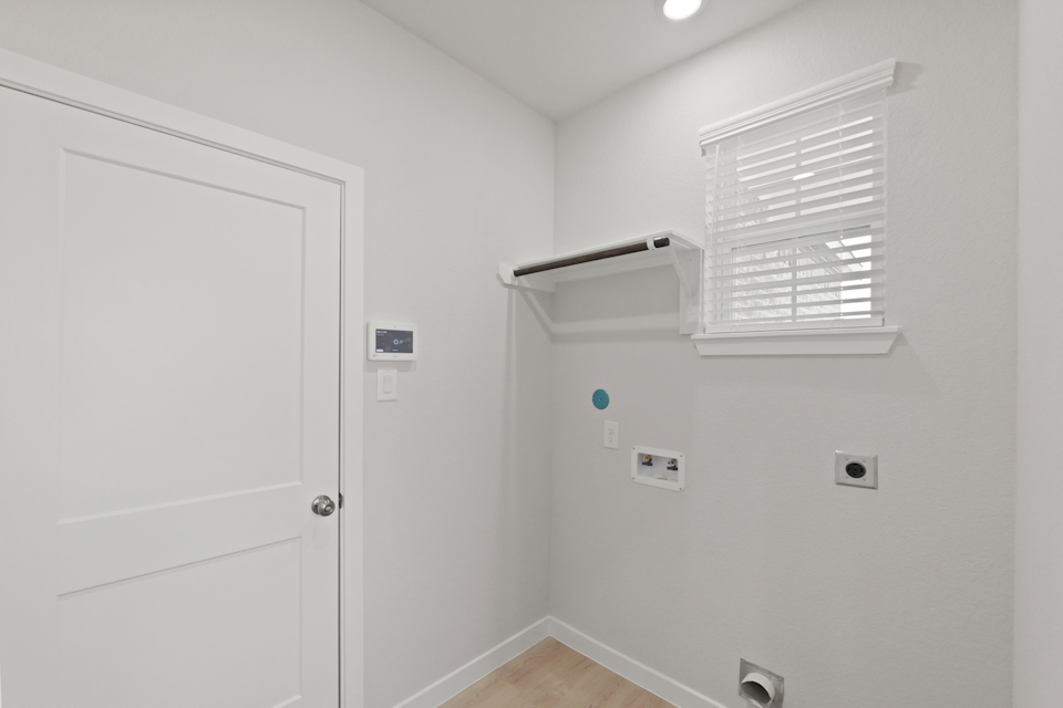 A white door with a window.
