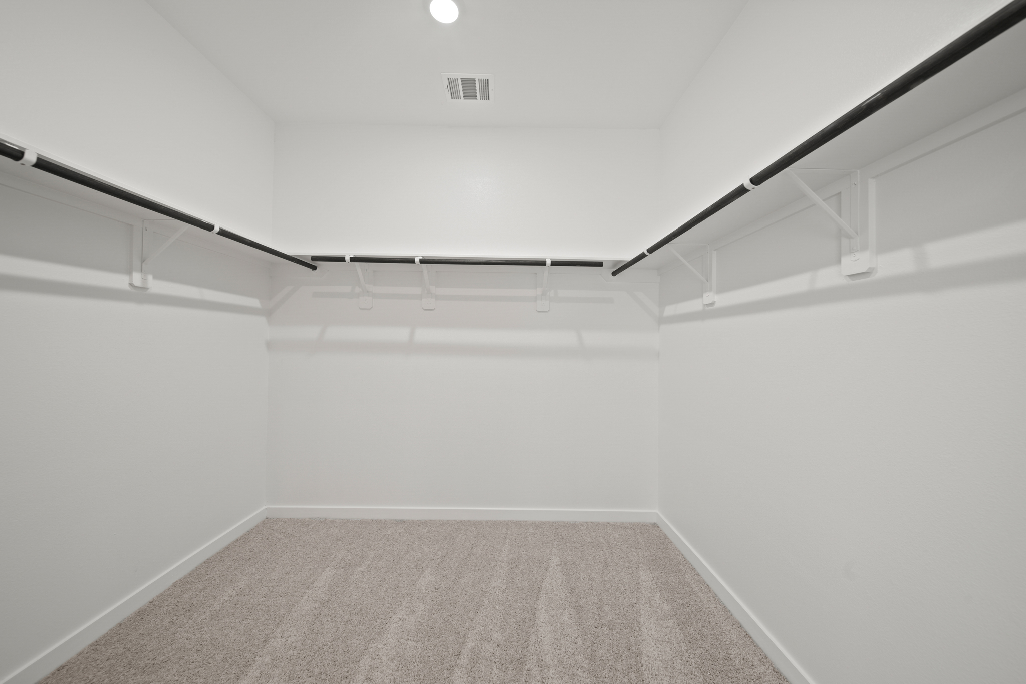 A white hallway with white walls.