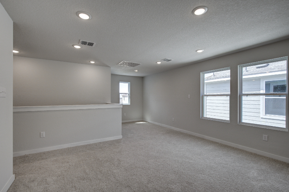 A room with a few windows.
