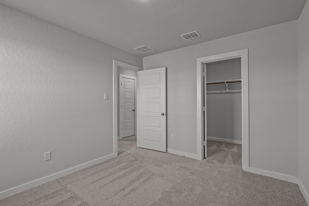 A room with white doors.