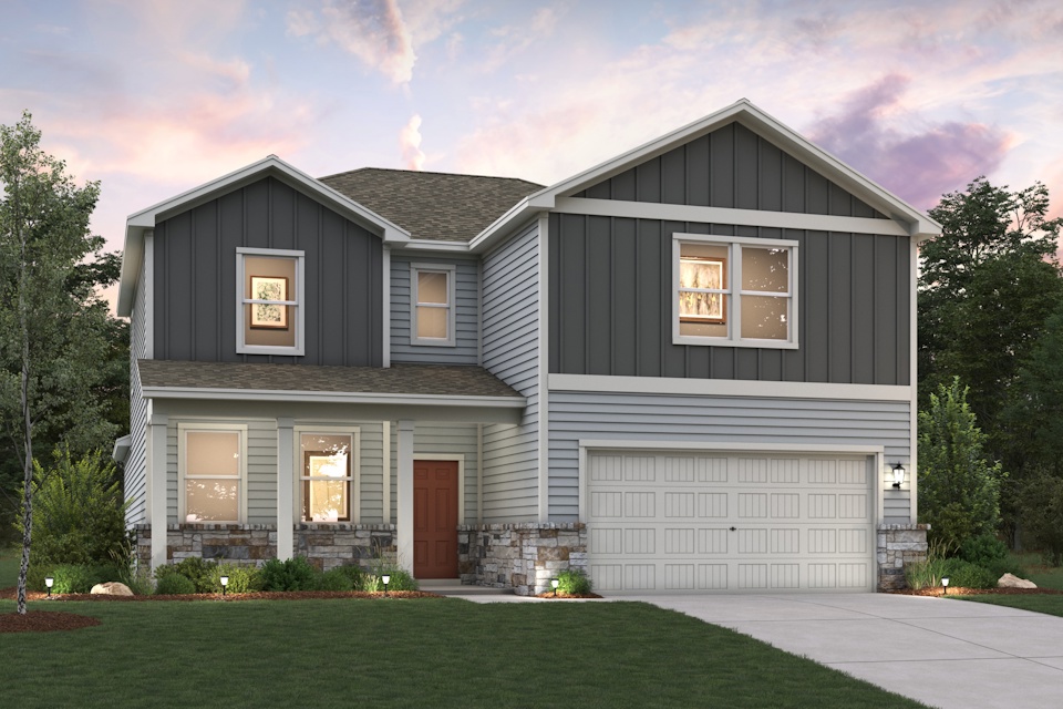 A grey house with a garage.