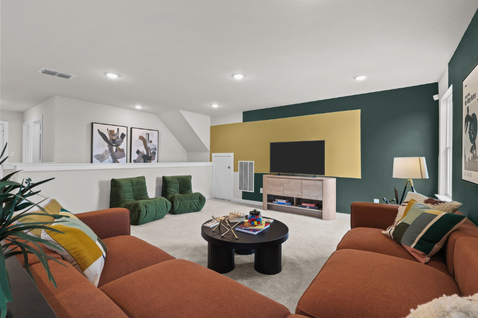 A living room with a tv and couches.