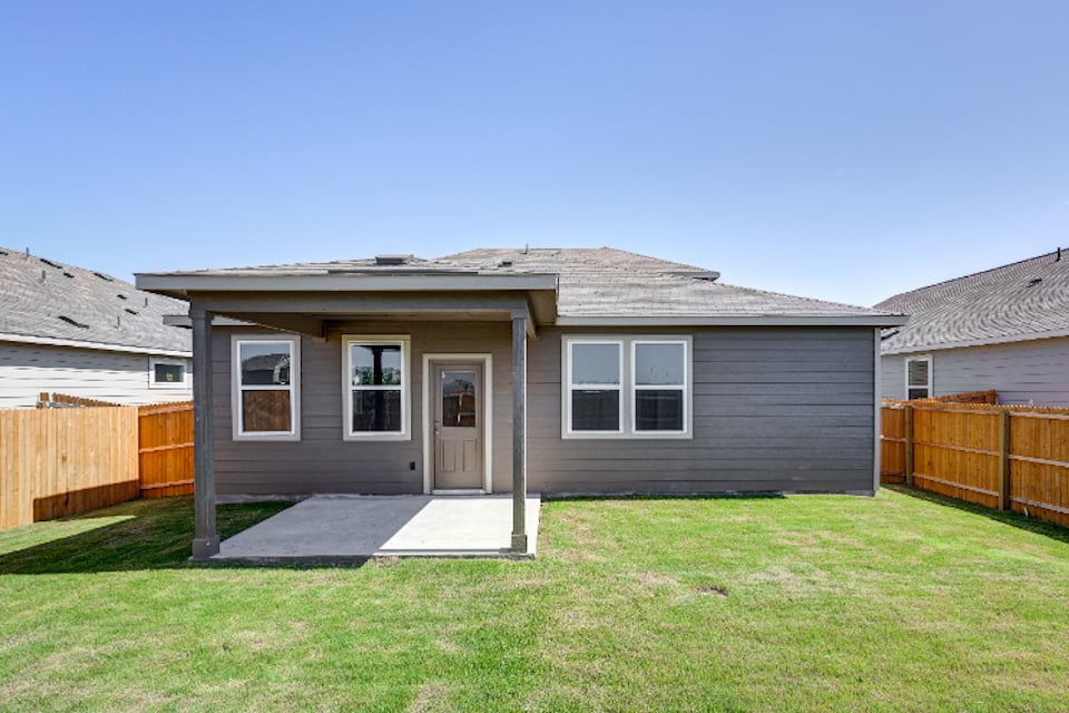 A house with a fence around it.