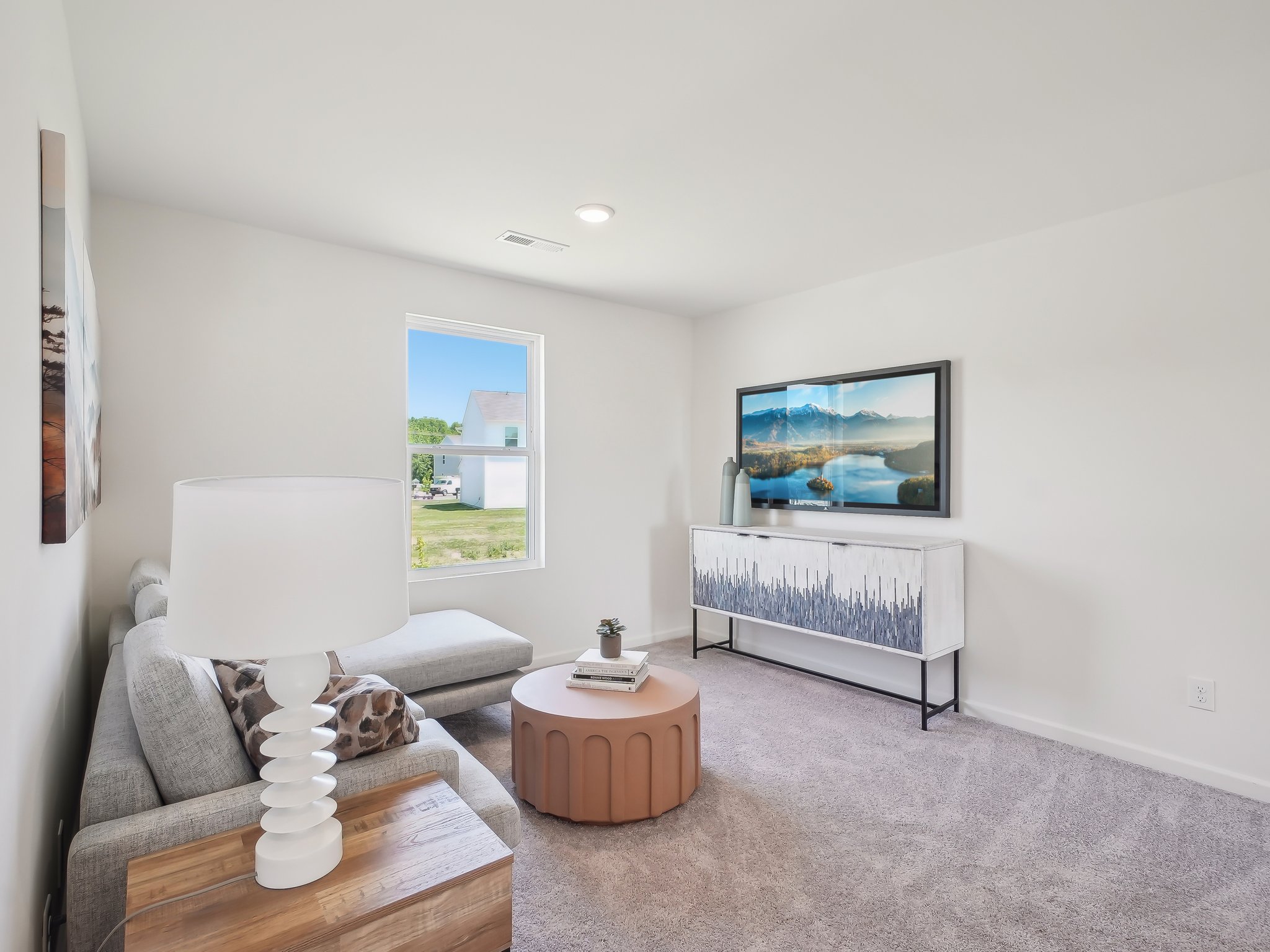 A living room with a tv and a couch.
