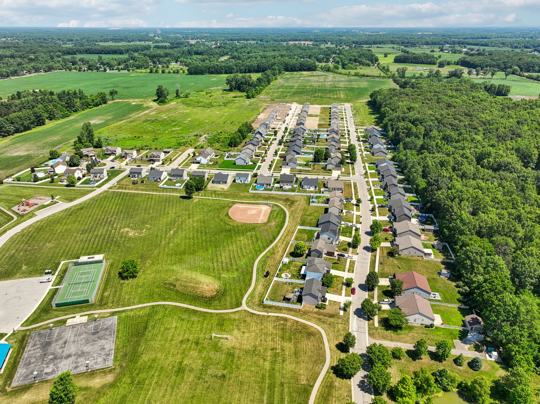 A landscape with trees and buildings.