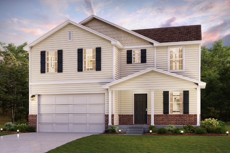 A white house with a lawn.