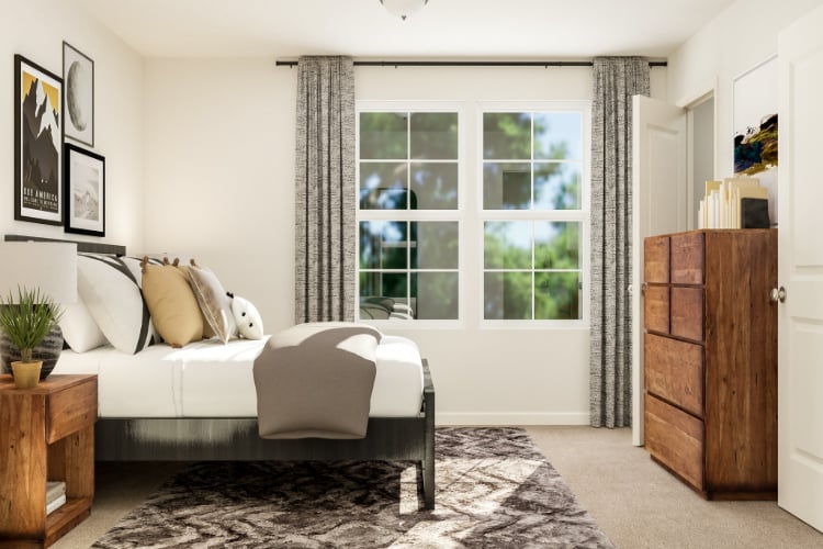 A living room with a couch and a table.