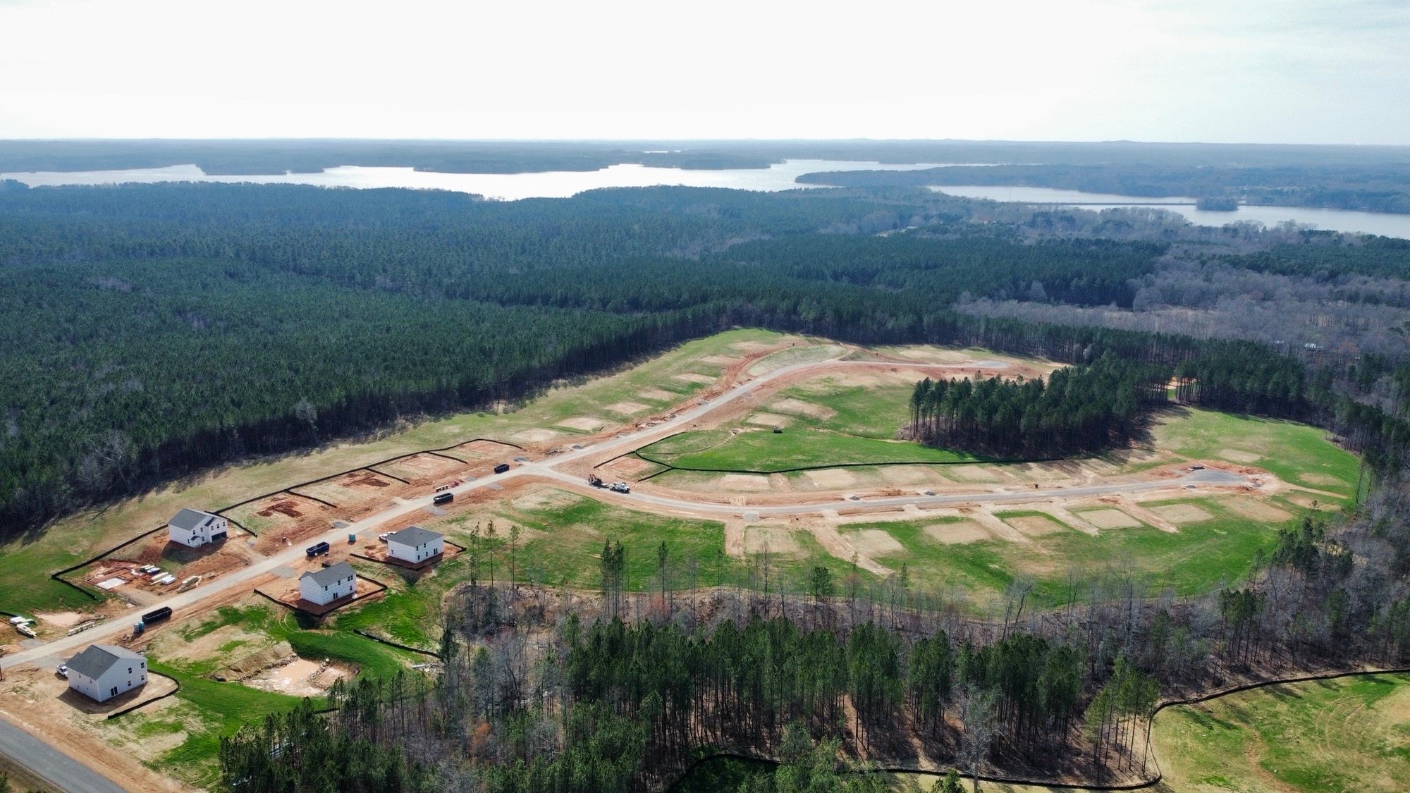 A landscape with trees and buildings.
