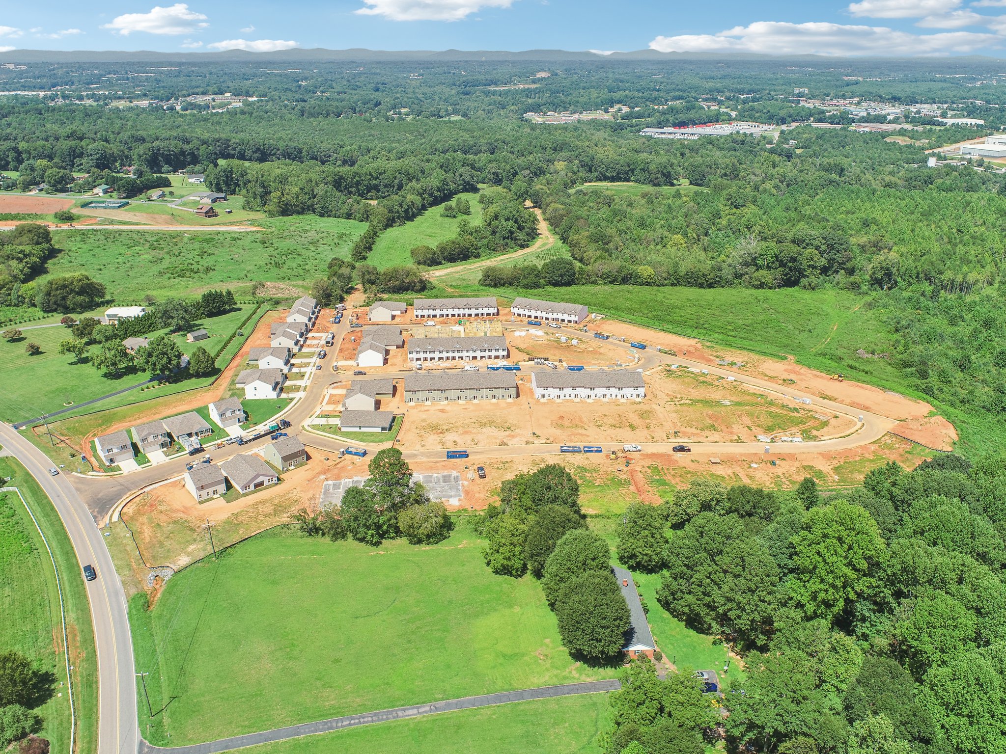 A large building surrounded by trees.